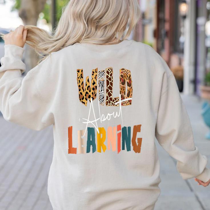 Wild About Learning Teacher Back To School Teaching Women's Sweatshirt Back Print