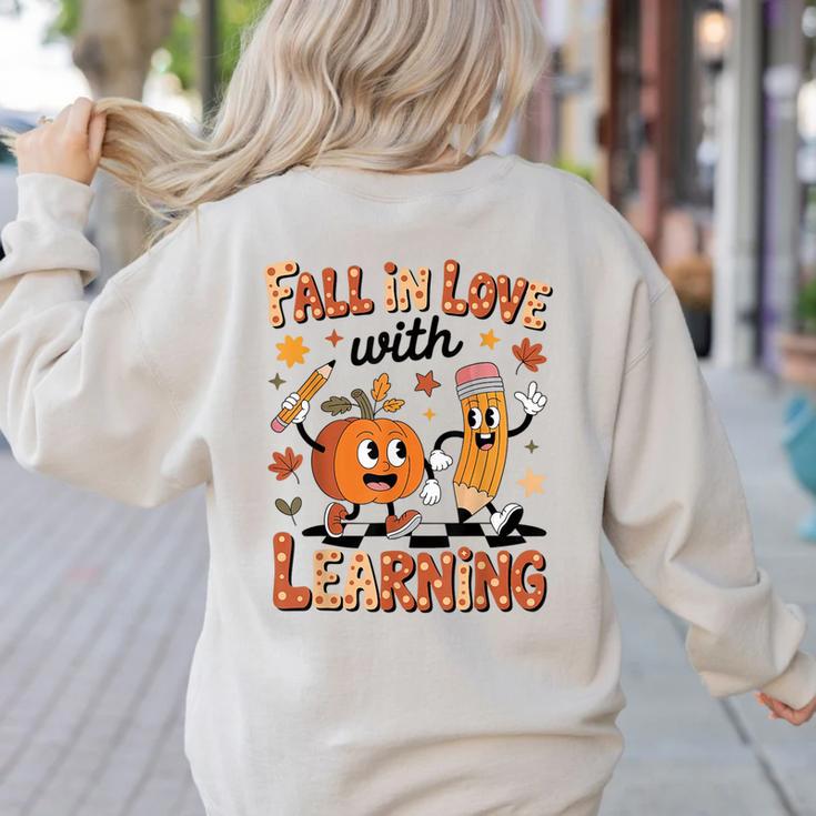 Retro Fall In Love With Learning Autumn Pumpkin Teacher Kids Women's Sweatshirt Back Print