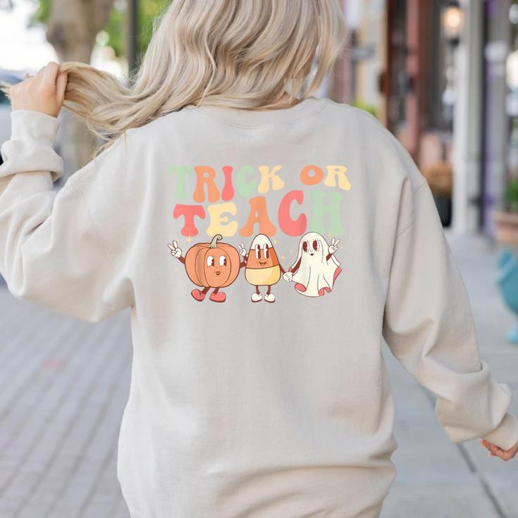 Trick Or Teach Pumpkin Candy Corn Ghost Halloween Teacher Women's Sweatshirt Back Print Trick Or Teach Pumpkin Candy Corn Ghost Halloween Teacher Women's Sweatshirt Back Print