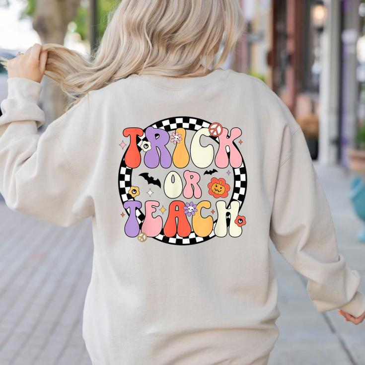 Trick Or Teach Retro Groovy Halloween Teacher Women's Sweatshirt Back Print Trick Or Teach Retro Groovy Halloween Teacher Women's Sweatshirt Back Print