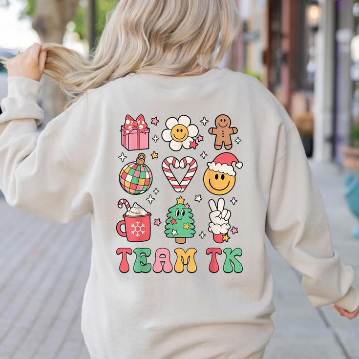 Team TK Teacher Christmas Groovy Smile Face Girl Boy Kid TK Women's Sweatshirt Back Print
