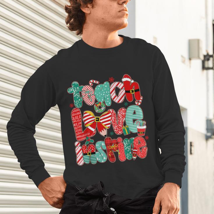 Christmas Coquette Bow Teacher Teach Love Inspire Unisex Long Sleeve T-Shirt, gift for family, gift for coworker Christmas Coquette Bow Teacher Teach Love Inspire Unisex Long Sleeve T-Shirt, gift for family, gift for coworker