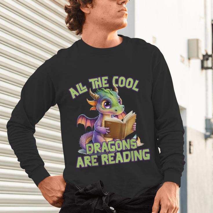 All The Cool Dragons Are Reading Dragon Teacher Unisex Long Sleeve T-Shirt, gift for family, gift for coworker All The Cool Dragons Are Reading Dragon Teacher Unisex Long Sleeve T-Shirt, gift for family, gift for coworker
