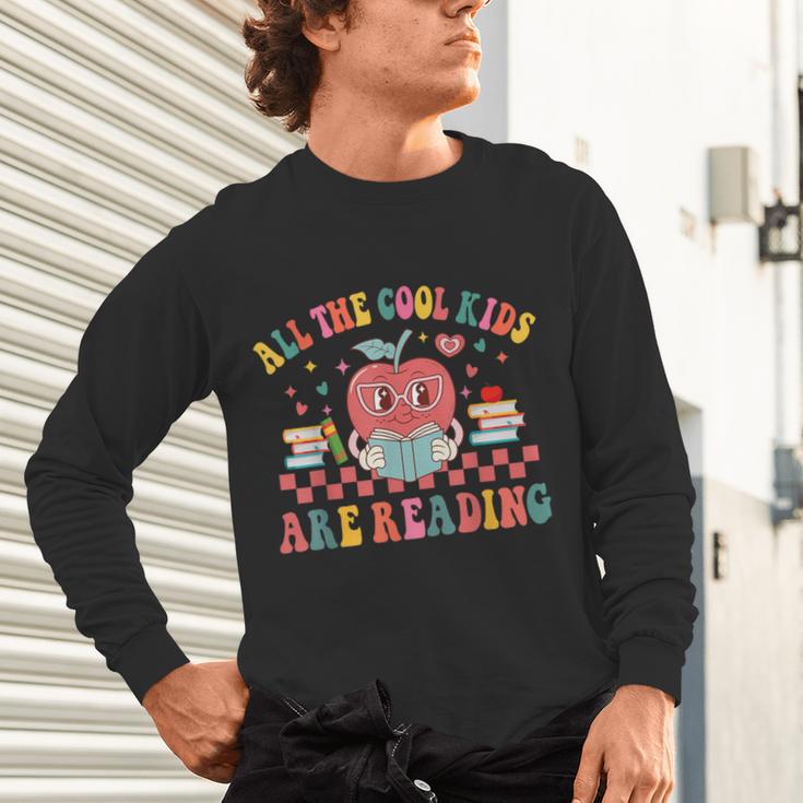 All The Cool Kids Are Reading Book Reading Teacher School Unisex Long Sleeve T-Shirt, gift for family, gift for coworker All The Cool Kids Are Reading Book Reading Teacher School Unisex Long Sleeve T-Shirt, gift for family, gift for coworker
