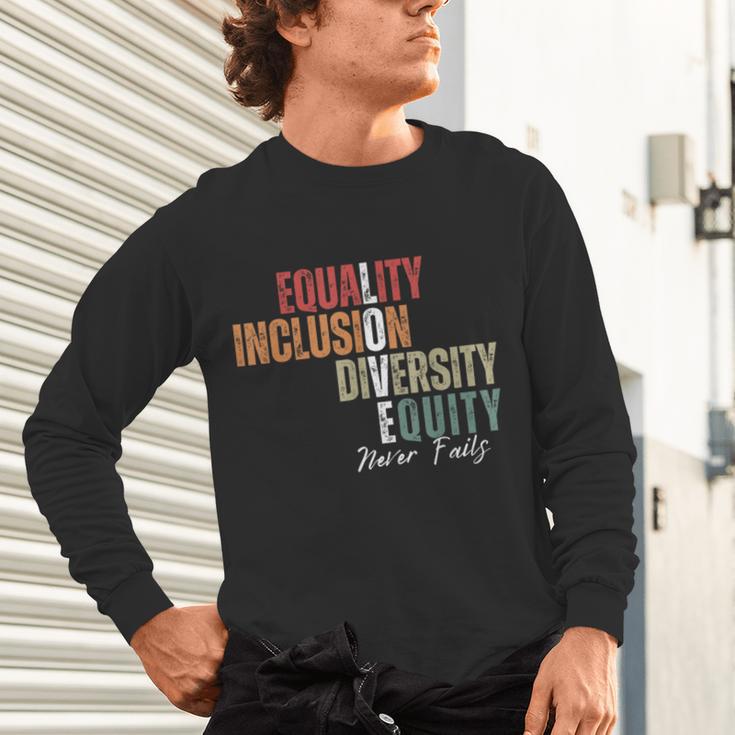Equality Inclusion Diversity Equity Love Never Fails Teacher Unisex Long Sleeve T-Shirt, gift for family, gift for coworker Equality Inclusion Diversity Equity Love Never Fails Teacher Unisex Long Sleeve T-Shirt, gift for family, gift for coworker