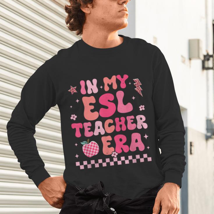 In My Esl Teacher Era Back To School ESL Teacher Groovy Unisex Long Sleeve T-Shirt, gift for family, gift for coworker In My Esl Teacher Era Back To School ESL Teacher Groovy Unisex Long Sleeve T-Shirt, gift for family, gift for coworker