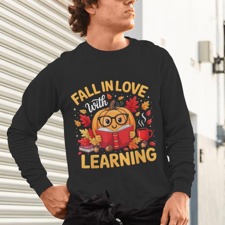 Fall In Love With Learning Pumpkin Thanksgiving Teacher Fall Unisex Long Sleeve T-Shirt, gift for family, gift for coworker Fall In Love With Learning Pumpkin Thanksgiving Teacher Fall Unisex Long Sleeve T-Shirt, gift for family, gift for coworker