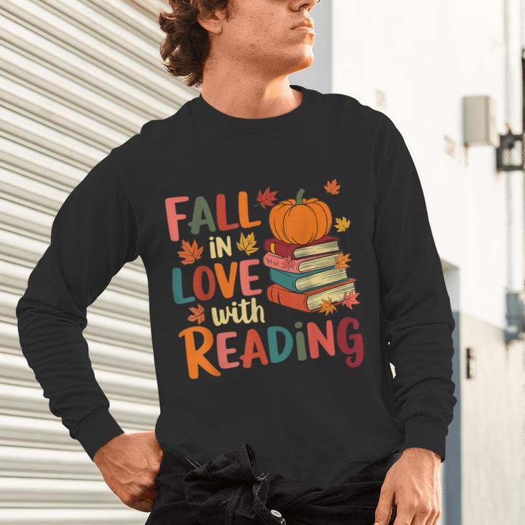 Fall In Love With Reading Autumn Thanksgiving Shirt Teacher Unisex Long Sleeve T-Shirt, gift for family, gift for coworker
