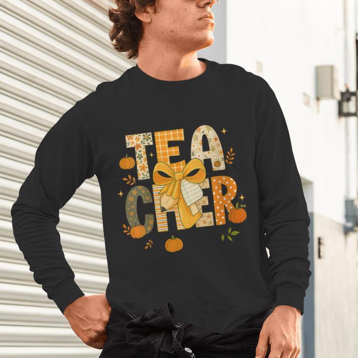 Fall Teacher Pumpkin Coquette Bow Autumn Classroom Unisex Long Sleeve T-Shirt, gift for family, gift for coworker Fall Teacher Pumpkin Coquette Bow Autumn Classroom Unisex Long Sleeve T-Shirt, gift for family, gift for coworker