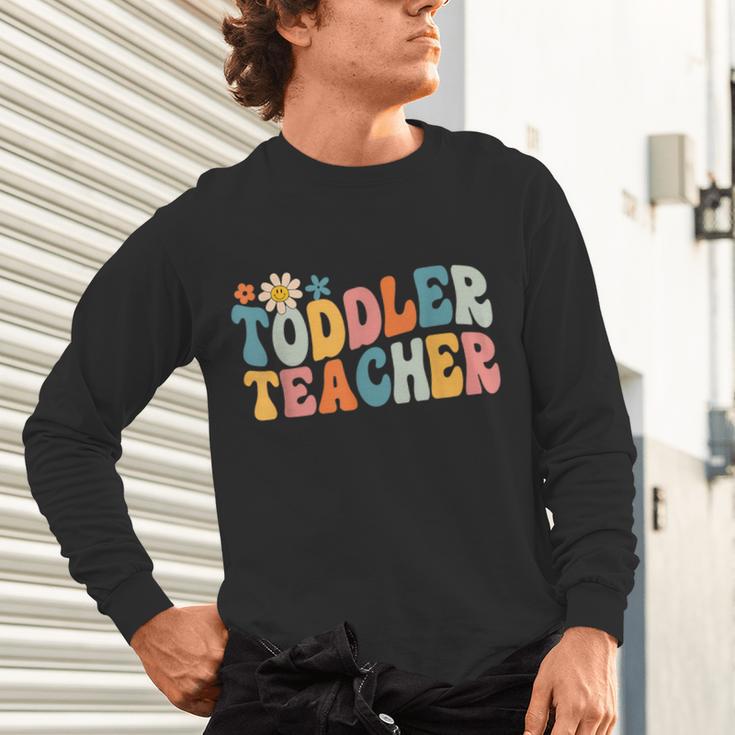 Groovy Toddler Teacher Appreciation Back To School Unisex Long Sleeve T-Shirt, gift for family, gift for coworker Groovy Toddler Teacher Appreciation Back To School Unisex Long Sleeve T-Shirt, gift for family, gift for coworker