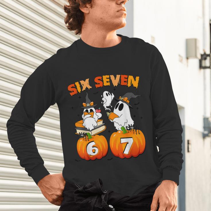 Haunted By 67 Boo Ghost Pumpkin Halloween Teacher Unisex Long Sleeve T-Shirt, gift for family, gift for coworker Haunted By 67 Boo Ghost Pumpkin Halloween Teacher Unisex Long Sleeve T-Shirt, gift for family, gift for coworker