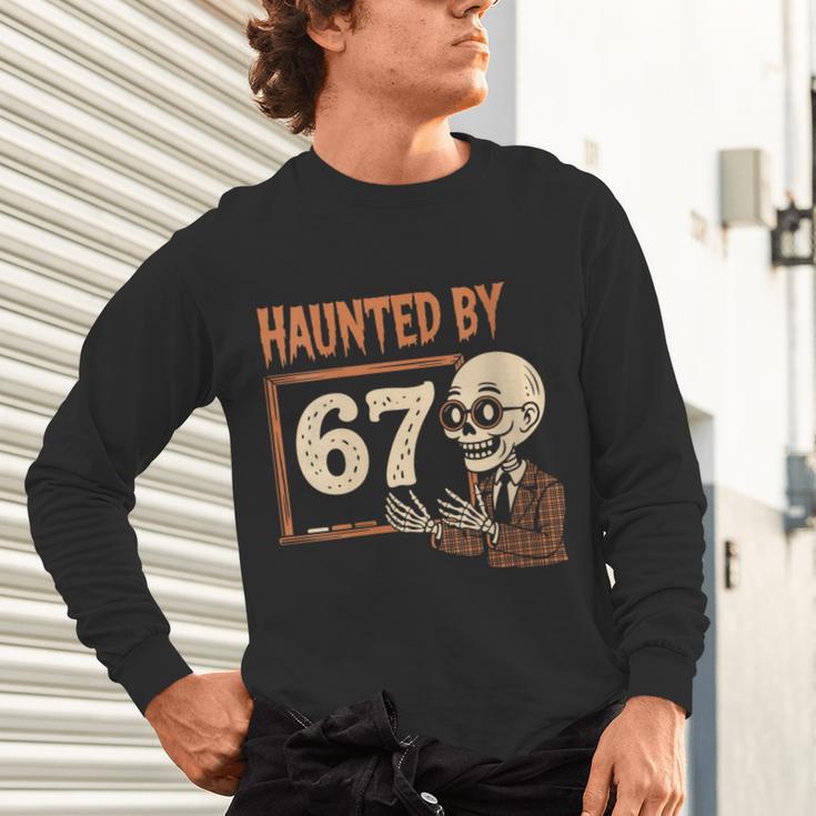 Haunted By 67 Halloween 67 Meme Six Seven Teacher Unisex Long Sleeve T-Shirt, gift for family, gift for coworker Haunted By 67 Halloween 67 Meme Six Seven Teacher Unisex Long Sleeve T-Shirt, gift for family, gift for coworker