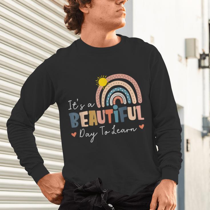It's A Beautiful Day To Learn Cute Rainbow Boho Teacher Unisex Long Sleeve T-Shirt, gift for family, gift for coworker It's A Beautiful Day To Learn Cute Rainbow Boho Teacher Unisex Long Sleeve T-Shirt, gift for family, gift for coworker