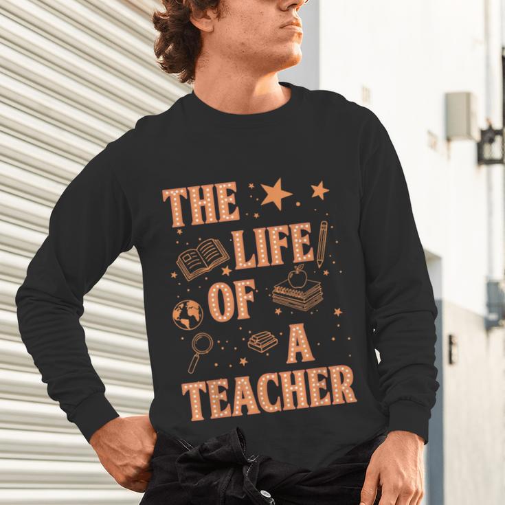 The Life Of A Teacher Back To School Women Men Unisex Long Sleeve T-Shirt, gift for family, gift for coworker