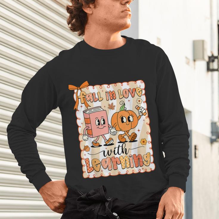Pumpkin Teacher Preppy Fall In Love With Learning Autumn Unisex Long Sleeve T-Shirt, gift for family, gift for coworker