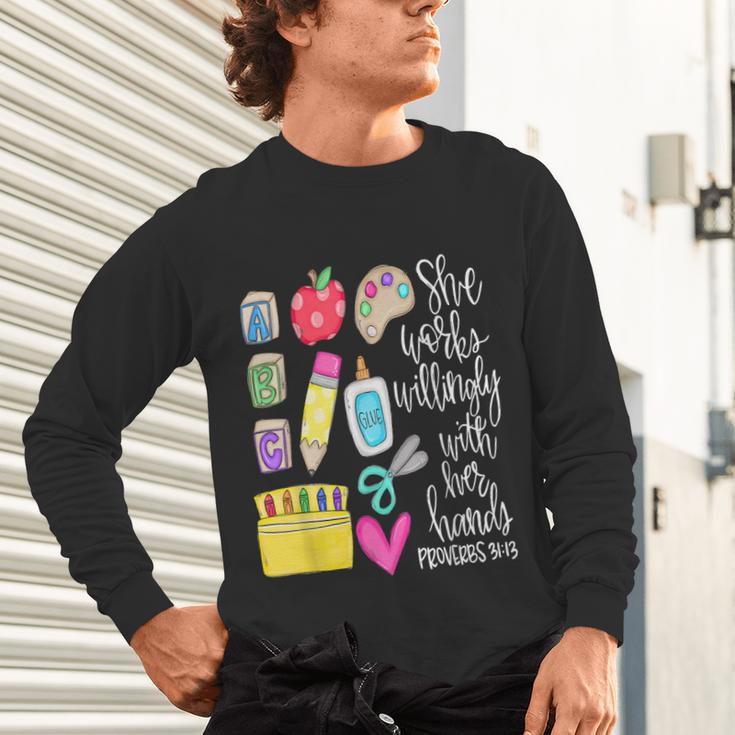 She Works Willingly With Her Hands Proverbs Daycare Teacher Men Women Unisex Long Sleeve T-Shirt, gift for family, gift for coworker She Works Willingly With Her Hands Proverbs Daycare Teacher Men Women Unisex Long Sleeve T-Shirt, gift for family, gift for coworker