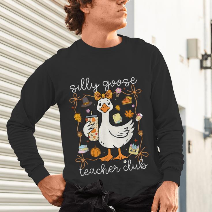 Silly Goose Teachers Club Cozy Fall Teacher Unisex Long Sleeve T-Shirt, gift for family, gift for coworker Silly Goose Teachers Club Cozy Fall Teacher Unisex Long Sleeve T-Shirt, gift for family, gift for coworker