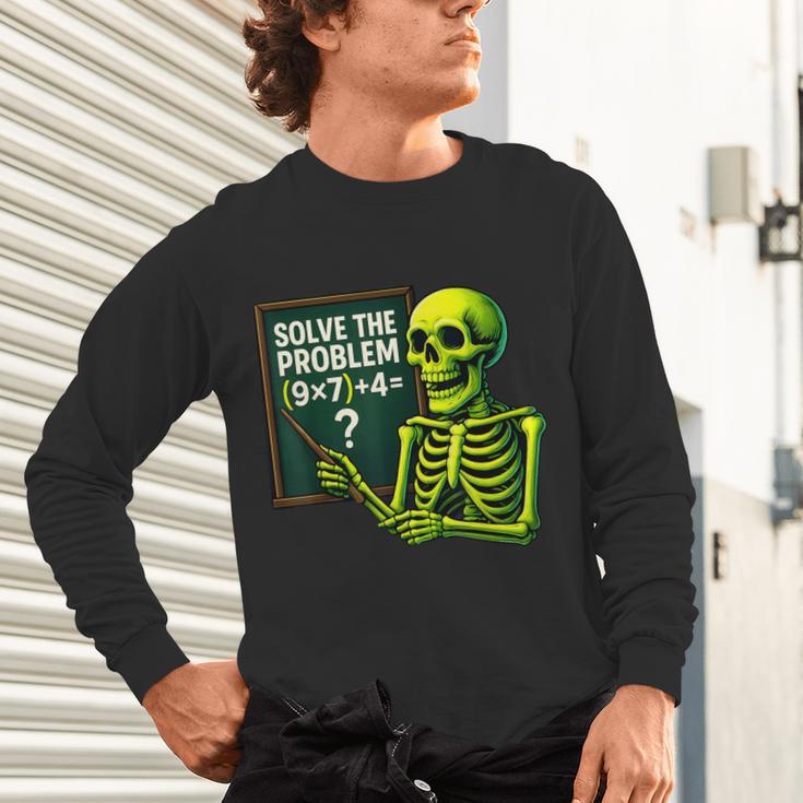 Solve The Problem Skeleton Teacher Halloween Math Six Seven Unisex Long Sleeve T-Shirt, gift for family, gift for coworker Solve The Problem Skeleton Teacher Halloween Math Six Seven Unisex Long Sleeve T-Shirt, gift for family, gift for coworker