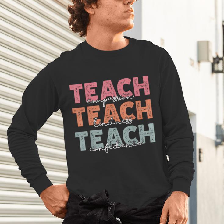 Teach Compassion Kindness Confidence For Teacher Unisex Long Sleeve T-Shirt, gift for family, gift for coworker Teach Compassion Kindness Confidence For Teacher Unisex Long Sleeve T-Shirt, gift for family, gift for coworker