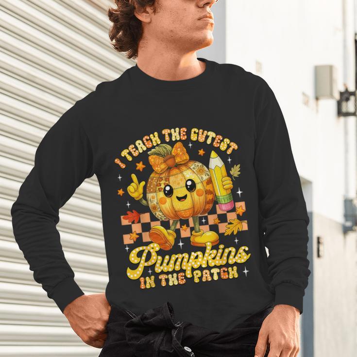 I Teach The Cutest Pumpkins In The Patch Teacher Halloween Unisex Long Sleeve T-Shirt, gift for family, gift for coworker I Teach The Cutest Pumpkins In The Patch Teacher Halloween Unisex Long Sleeve T-Shirt, gift for family, gift for coworker