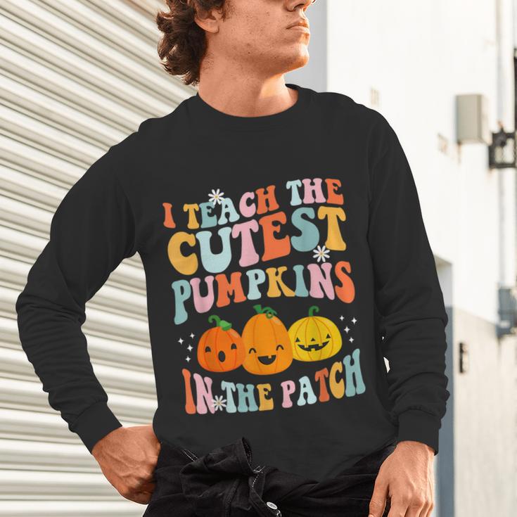 I Teach The Cutest Pumpkins In The Patch Teacher Unisex Long Sleeve T-Shirt, gift for family, gift for coworker I Teach The Cutest Pumpkins In The Patch Teacher Unisex Long Sleeve T-Shirt, gift for family, gift for coworker