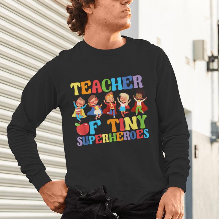 Teacher Of Tiny Superheroes Teach 100th Day Of School Unisex Long Sleeve T-Shirt, gift for family, gift for coworker Teacher Of Tiny Superheroes Teach 100th Day Of School Unisex Long Sleeve T-Shirt, gift for family, gift for coworker
