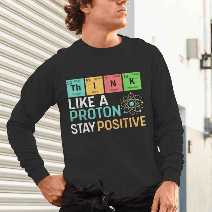 Think Like A Proton Stay Positive Science Teacher Unisex Long Sleeve T-Shirt, gift for family, gift for coworker
