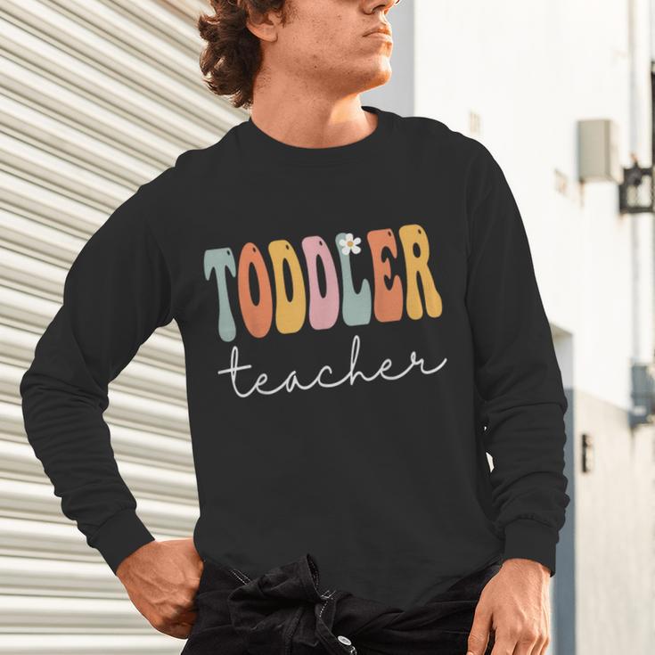 Toddler Teacher Retro Groovy Women Happy First Day Of School Unisex Long Sleeve T-Shirt, gift for family, gift for coworker Toddler Teacher Retro Groovy Women Happy First Day Of School Unisex Long Sleeve T-Shirt, gift for family, gift for coworker