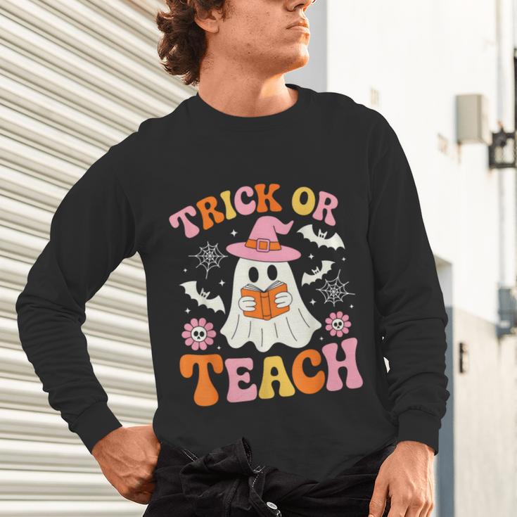 Trick Or Teach Cute Floral Ghost Teacher Halloween Costume Unisex Long Sleeve T-Shirt, gift for family, gift for coworker Trick Or Teach Cute Floral Ghost Teacher Halloween Costume Unisex Long Sleeve T-Shirt, gift for family, gift for coworker