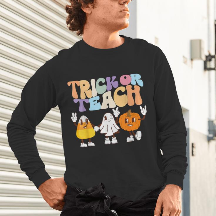 Trick Or Teach Cute Halloween Teacher Unisex Long Sleeve T-Shirt, gift for family, gift for coworker