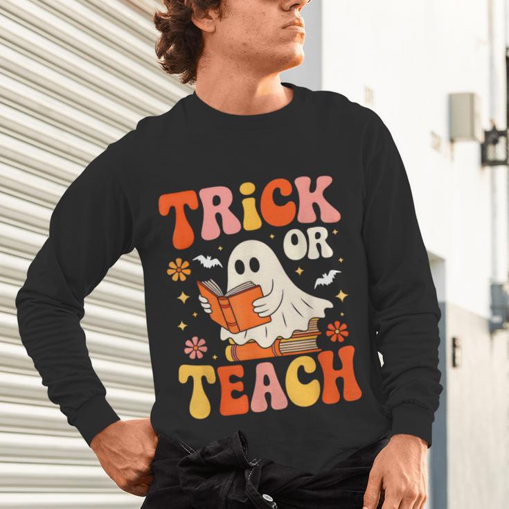 Trick Or Teach Halloween Shirt For Teacher Kids Floral Ghost Unisex Long Sleeve T-Shirt, gift for family, gift for coworker