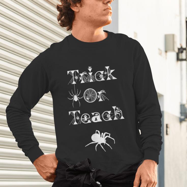 Trick Or Teach Halloween Teacher Shirt Teaching Spider Tee For Men Women Kids Unisex Long Sleeve T-Shirt, gift for family, gift for coworker Trick Or Teach Halloween Teacher Shirt Teaching Spider Tee For Men Women Kids Unisex Long Sleeve T-Shirt, gift for family, gift for coworker