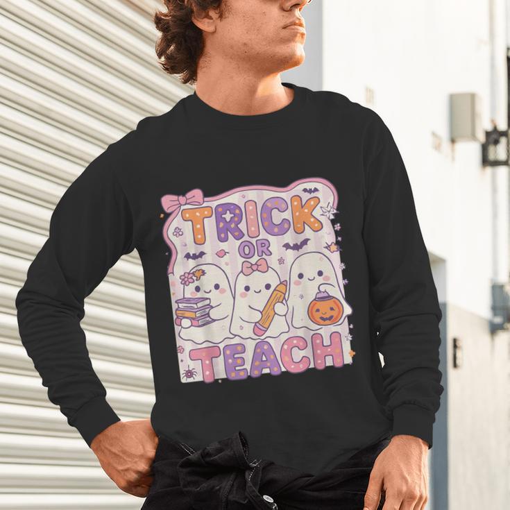Trick Or Teach Retro Halloween Teacher Look Unisex Long Sleeve T-Shirt, gift for family, gift for coworker Trick Or Teach Retro Halloween Teacher Look Unisex Long Sleeve T-Shirt, gift for family, gift for coworker