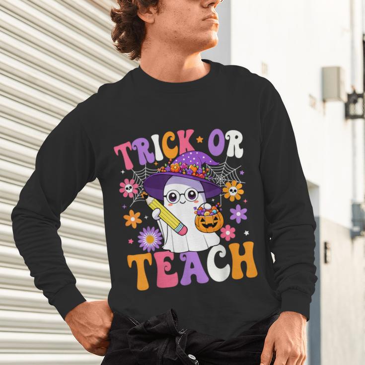 Trick Or Teach Teacher Ghost Teaching Fun Halloween Teacher Unisex Long Sleeve T-Shirt, gift for family, gift for coworker Trick Or Teach Teacher Ghost Teaching Fun Halloween Teacher Unisex Long Sleeve T-Shirt, gift for family, gift for coworker