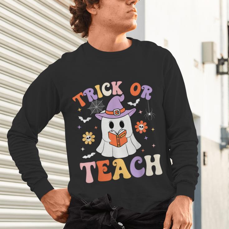 Trick Or Teach Teacher Groovy Ghost Halloween Teacher Unisex Long Sleeve T-Shirt, gift for family, gift for coworker