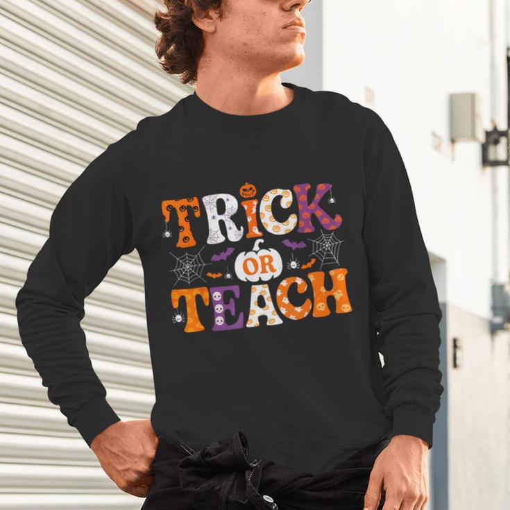 Trick Or Teach Teacher Halloween Costume Men Women Unisex Long Sleeve T-Shirt, gift for family, gift for coworker Trick Or Teach Teacher Halloween Costume Men Women Unisex Long Sleeve T-Shirt, gift for family, gift for coworker