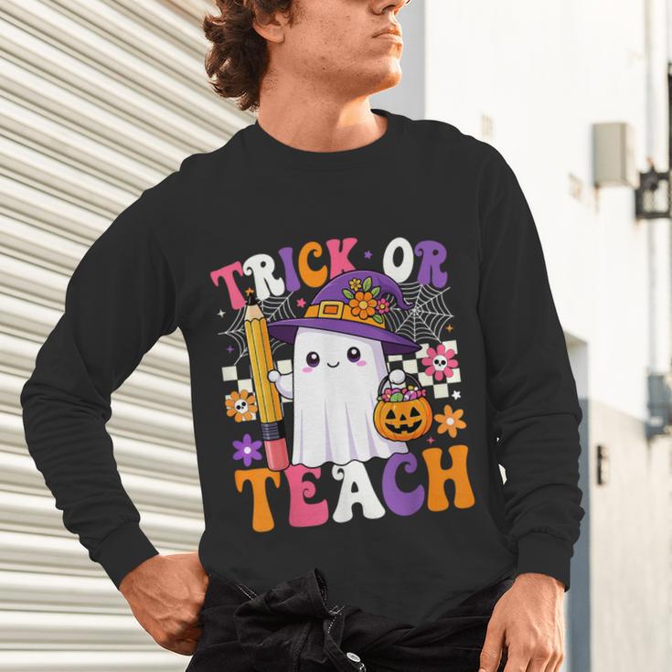 Trick Or Teach Teacher Pencil Ghost Halloween Teacher Unisex Long Sleeve T-Shirt, gift for family, gift for coworker Trick Or Teach Teacher Pencil Ghost Halloween Teacher Unisex Long Sleeve T-Shirt, gift for family, gift for coworker