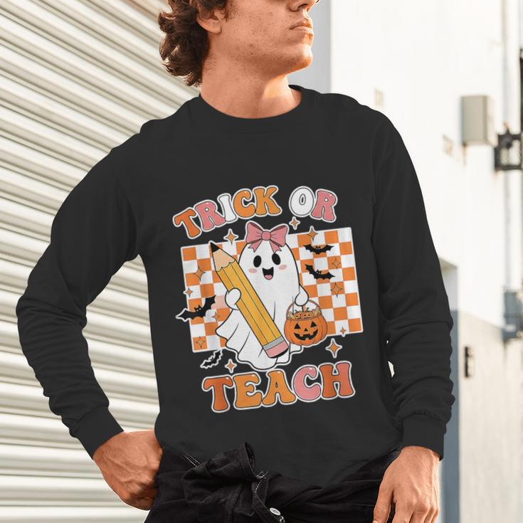 Vintage Teacher Shirt Women Trick Or Teach Halloween Unisex Long Sleeve T-Shirt, gift for family, gift for coworker Vintage Teacher Shirt Women Trick Or Teach Halloween Unisex Long Sleeve T-Shirt, gift for family, gift for coworker