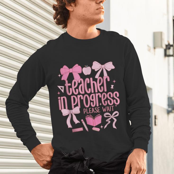 Women Teacher In Progress Coquette Pink Bow Future Teacher Unisex Long Sleeve T-Shirt, gift for family, gift for coworker