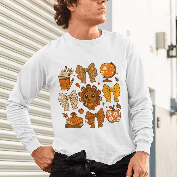 Coquette Teach Teacher Bows Thanksgiving Turkey Fall Autumn Unisex Long Sleeve T-Shirt, gift for family, gift for coworker Coquette Teach Teacher Bows Thanksgiving Turkey Fall Autumn Unisex Long Sleeve T-Shirt, gift for family, gift for coworker