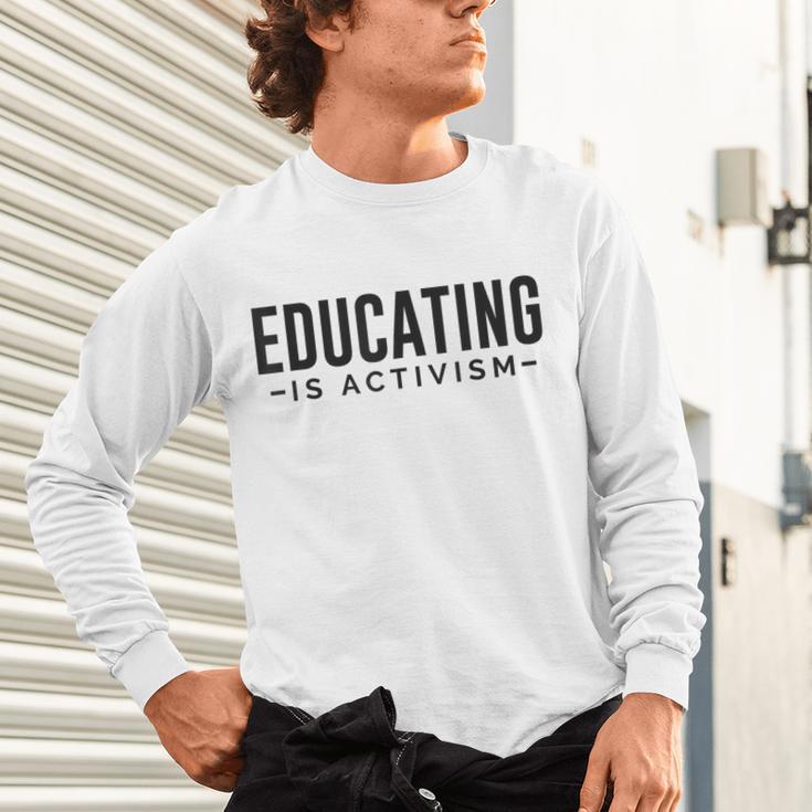 Educating Is Activism Feminist Social Justice Teacher For Men Women Unisex Long Sleeve T-Shirt, gift for family, gift for coworker Educating Is Activism Feminist Social Justice Teacher For Men Women Unisex Long Sleeve T-Shirt, gift for family, gift for coworker