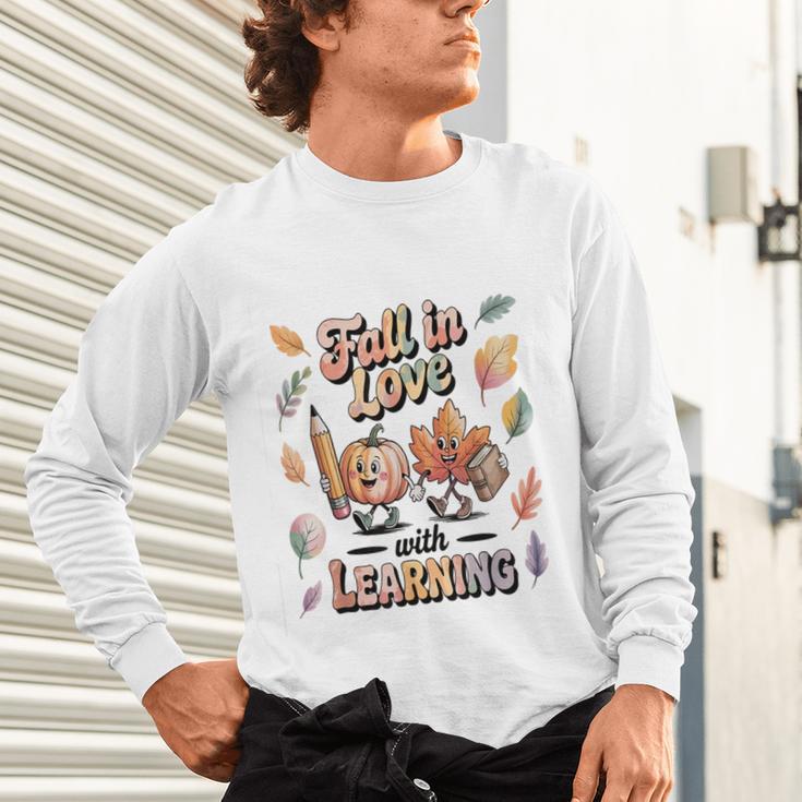 Fall In Love With Learning Teacher Autumn School Unisex Long Sleeve T-Shirt, gift for family, gift for coworker Fall In Love With Learning Teacher Autumn School Unisex Long Sleeve T-Shirt, gift for family, gift for coworker