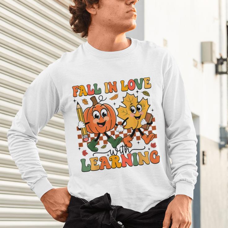 Fall In Love With Learning Thanksgiving Teacher Student Unisex Long Sleeve T-Shirt, gift for family, gift for coworker Fall In Love With Learning Thanksgiving Teacher Student Unisex Long Sleeve T-Shirt, gift for family, gift for coworker