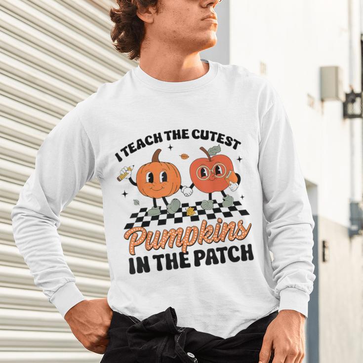 Groovy I Teach The Cutest Pumpkins In The Patch For Teacher Unisex Long Sleeve T-Shirt, gift for family, gift for coworker Groovy I Teach The Cutest Pumpkins In The Patch For Teacher Unisex Long Sleeve T-Shirt, gift for family, gift for coworker