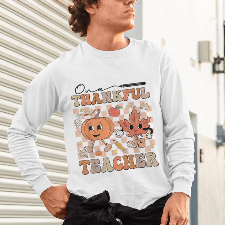 One Thankful Teacher Thanksgiving Groovy Fall Autumn Teacher Unisex Long Sleeve T-Shirt, gift for family, gift for coworker One Thankful Teacher Thanksgiving Groovy Fall Autumn Teacher Unisex Long Sleeve T-Shirt, gift for family, gift for coworker