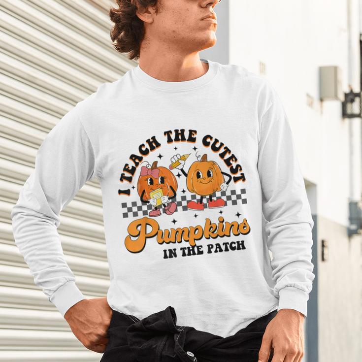 I Teach The Cutest Pumpkins In The Patch Halloween Teacher For Men Women Kids Unisex Long Sleeve T-Shirt, gift for family, gift for coworker I Teach The Cutest Pumpkins In The Patch Halloween Teacher For Men Women Kids Unisex Long Sleeve T-Shirt, gift for family, gift for coworker