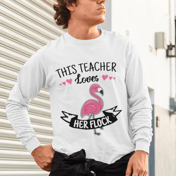 This Teacher Loves Her Flock Cute Flamingo Teacher Unisex Long Sleeve T-Shirt, gift for family, gift for coworker This Teacher Loves Her Flock Cute Flamingo Teacher Unisex Long Sleeve T-Shirt, gift for family, gift for coworker