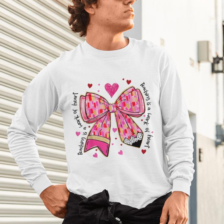 Teaching Is A Work Of Heart Pencil Bow Teacher Valentine Unisex Long Sleeve T-Shirt, gift for family, gift for coworker Teaching Is A Work Of Heart Pencil Bow Teacher Valentine Unisex Long Sleeve T-Shirt, gift for family, gift for coworker
