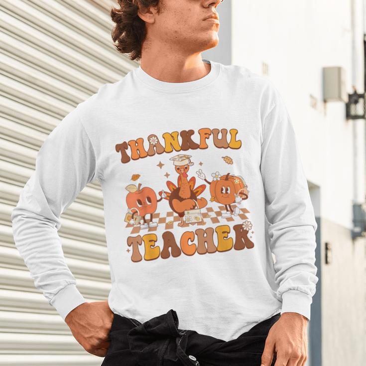 Thankful Teacher Retro Groovy Thanksgiving Fall Women Men Unisex Long Sleeve T-Shirt, gift for family, gift for coworker Thankful Teacher Retro Groovy Thanksgiving Fall Women Men Unisex Long Sleeve T-Shirt, gift for family, gift for coworker