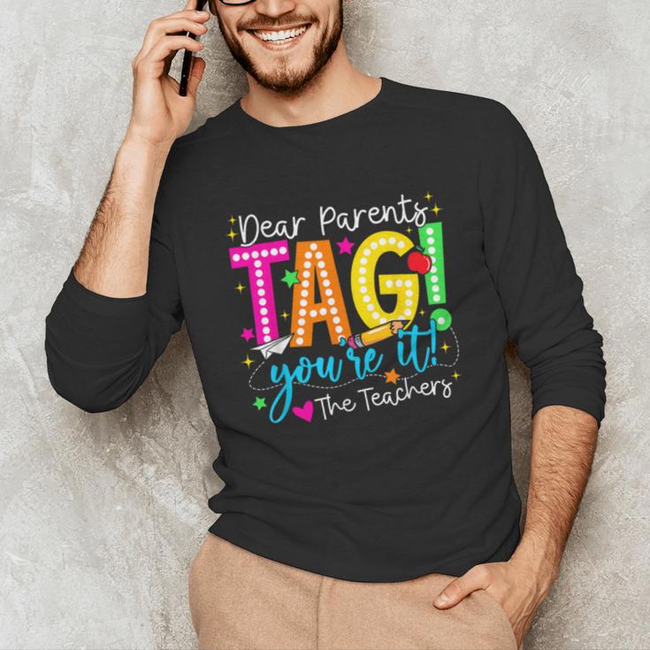 Dear Parents Tag You'Re It Love Teachers Last Day Of School Unisex Long Sleeve T-Shirt, funny gift Dear Parents Tag You'Re It Love Teachers Last Day Of School Unisex Long Sleeve T-Shirt, funny gift